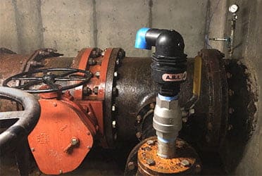 A second pressure transmitter and its old dial gauge on the other side of the pressure relief valve