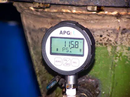 One of the digital absolute pressure gauges on the discharge nozzle of a pump