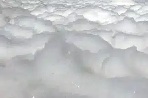 Surface foam can cause problems for non-contact sensors
