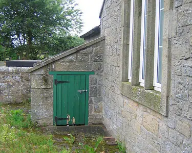 Residential heating oil tank access door