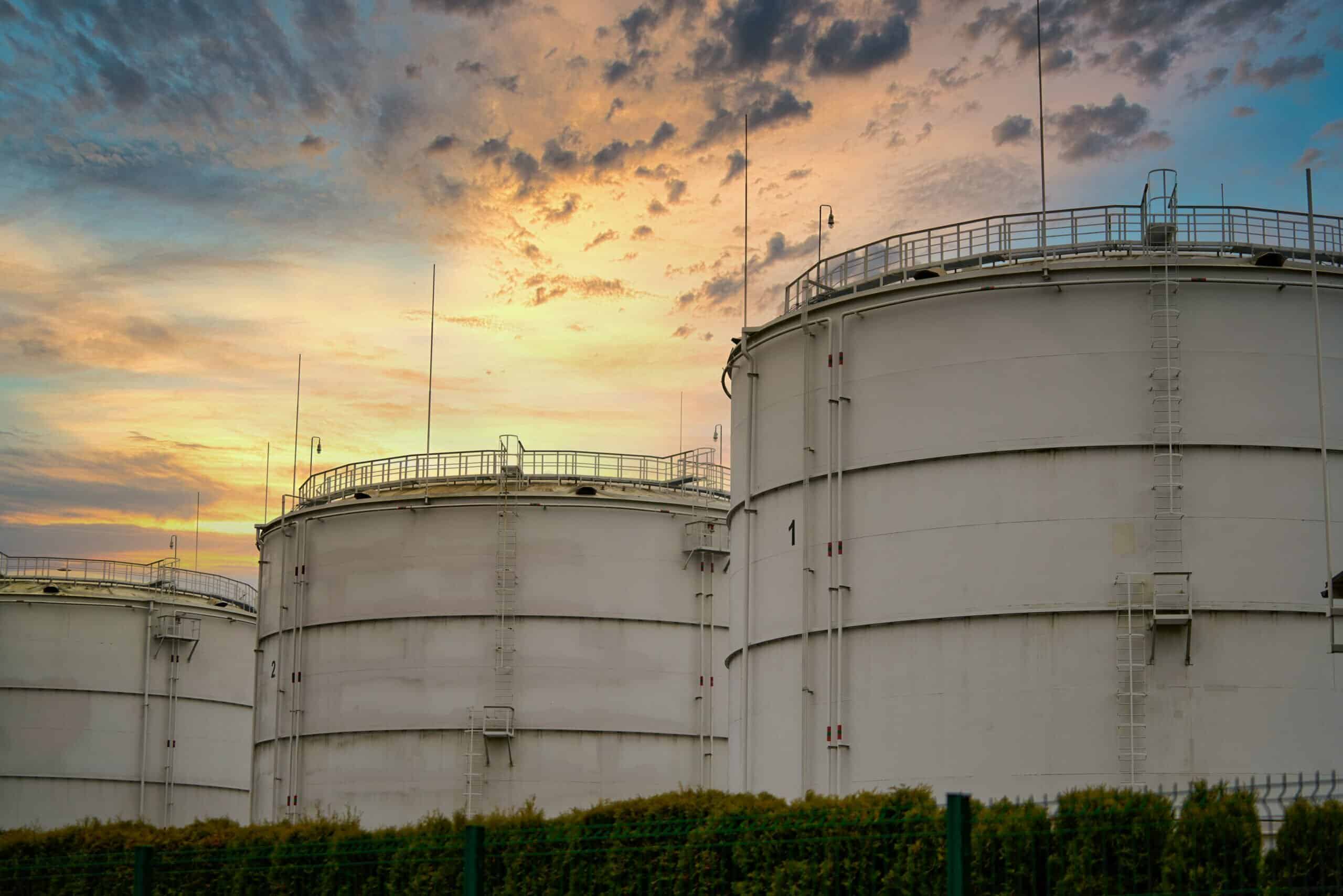 Industrial Oil Tanks at sunset